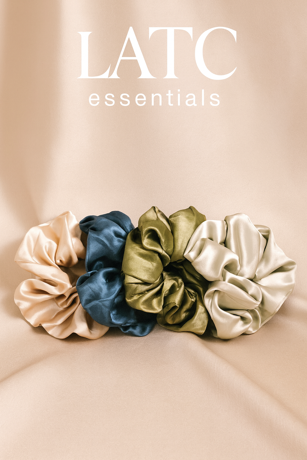 Jumbo satin scrunchies in olive, turquoise, mint, and pearl. Gentle, no-tug hold for curls, coils, braids & locs. Quiet luxury by LATC Essentials.